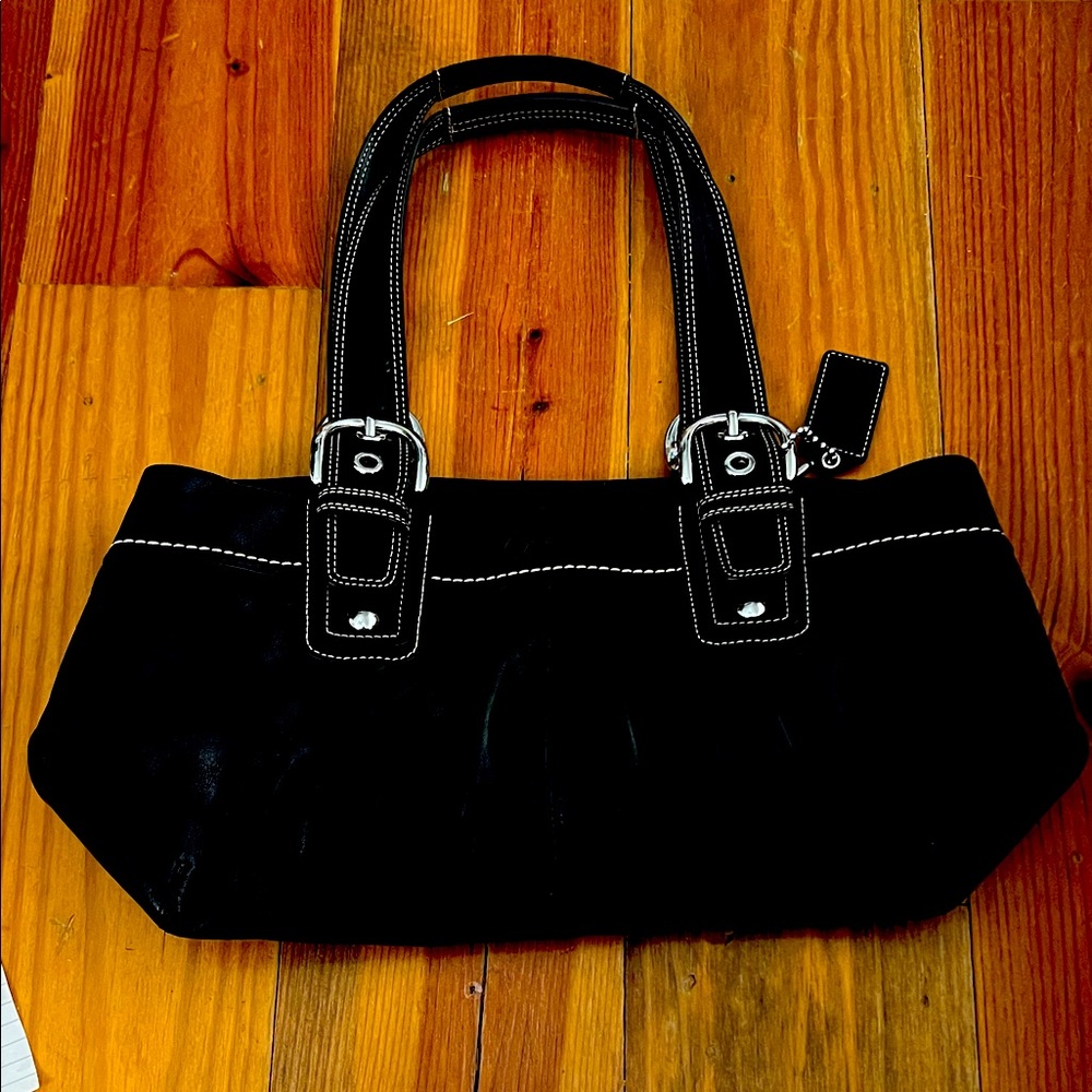 Black leather Coach brand handbag ,17”x8”x4”